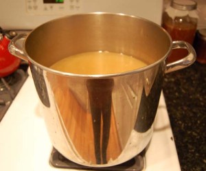 strained stock in a pot